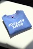 Dziecięca bluza oversize w kolorze niebieskim z napisem JOURNEY KIDDO dla małych podróżników