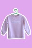 Bluza liliowa dla dziecka z napisem W PODRÓŻY MI DO TWARZY oversize unisex
